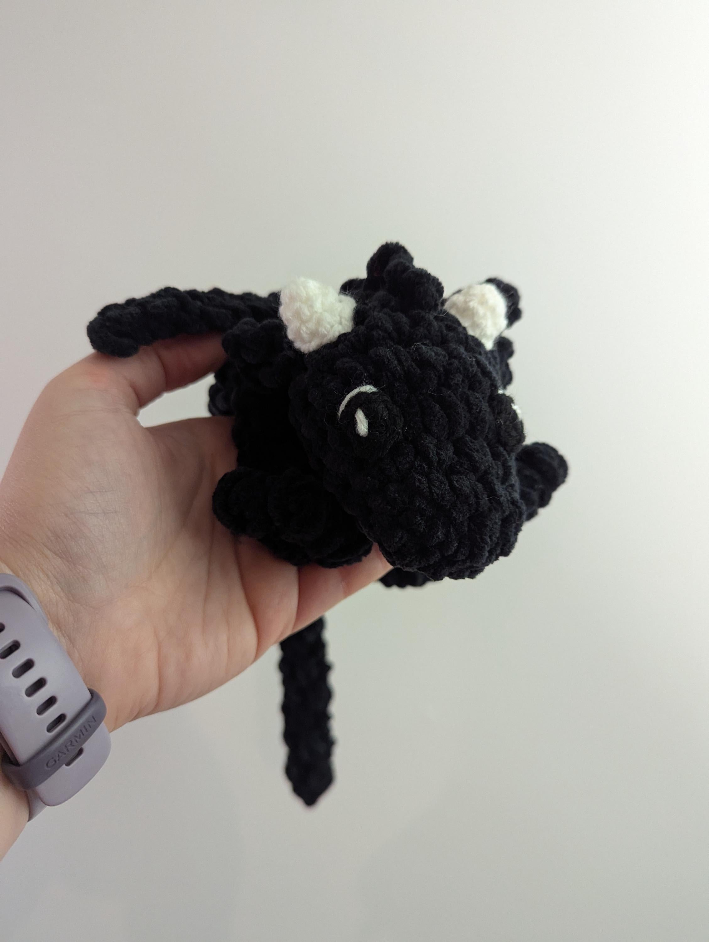 Plush crocheted dragon lovey, soft cuddly toy