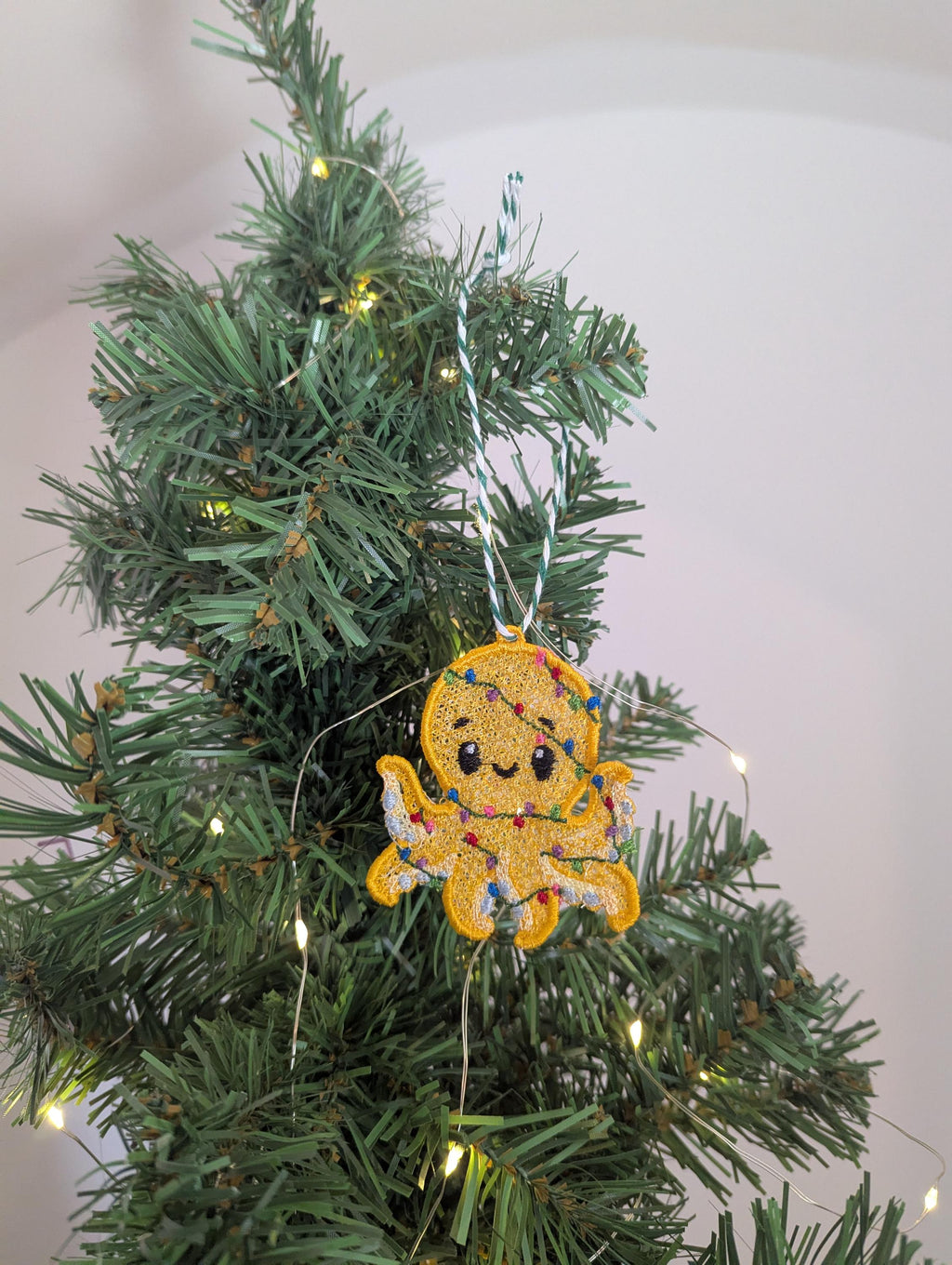 Embroidered hanging Octopus, Christmas decorations, wrapped in lights, machine embroidery