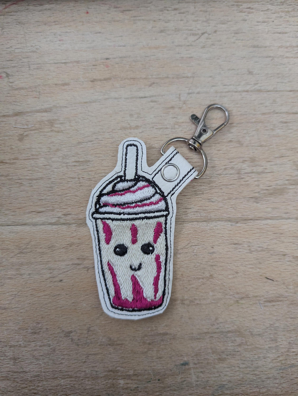 Frappe keychain, machine embroidered keyring