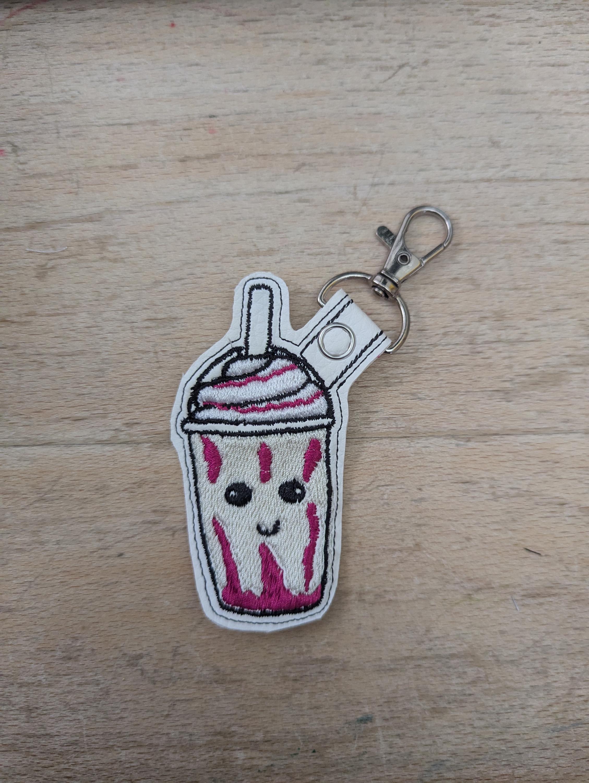 Frappe keychain, machine embroidered keyring