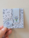 Lavender floral magnetic bookmark with bible verse on the back