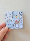 Lighthouse magnetic bookmark with bible verse on the back