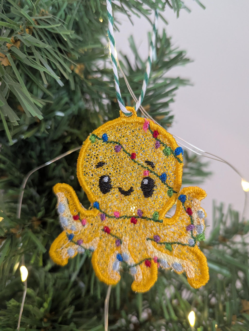 Embroidered hanging Octopus, Christmas decorations, wrapped in lights, machine embroidery