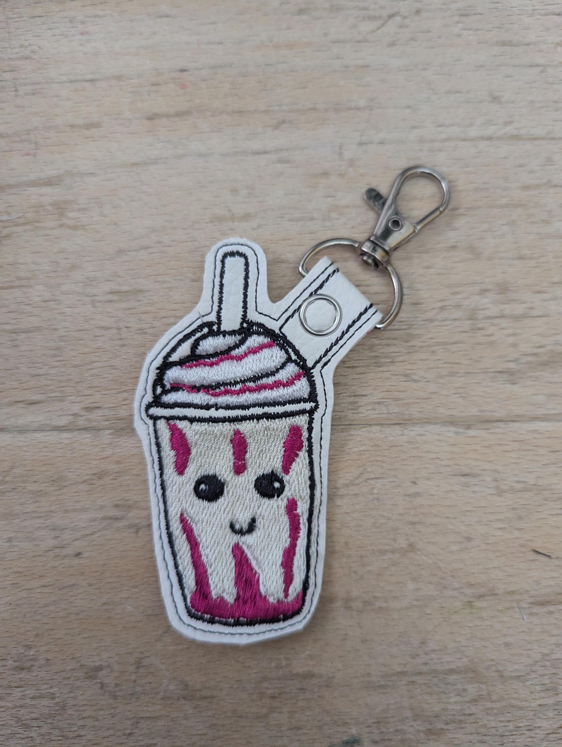 Frappe keychain, machine embroidered keyring