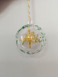 Personalised hand painted name bauble with embroidered star suspended in centre